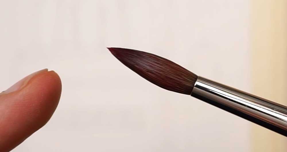 a blotted brush gives a fine tip