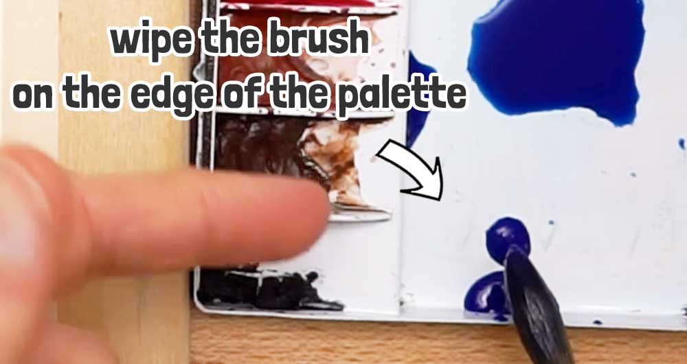 wipe the brush tip to remove moisture
